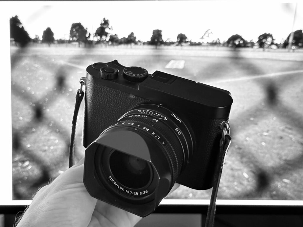 leica q2 monochrom - photo of the stunning camera from leica in front of a sample image